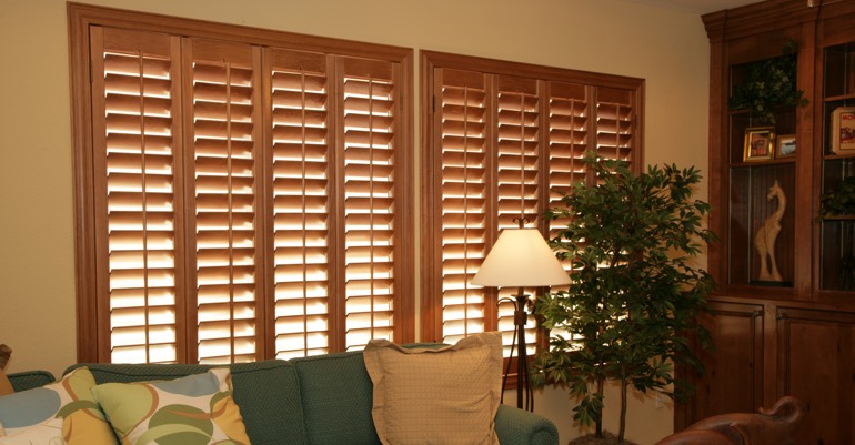 Natural wood shutters in Las Vegas living room.